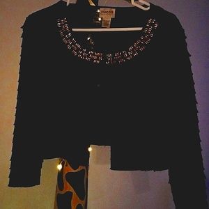 Ladies size 1, fringed light weight 3/4 arms. Beaded around the front.